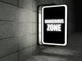 Dangerous zone warning sign at night