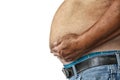 The Dangers of Belly Fat., Obese Man in Jeans Squeeze the Belly Royalty Free Stock Photo