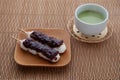 dango dumpling with azuki red beans paste with matcha latte isolated on table Royalty Free Stock Photo