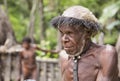 Dani tribe man in a village in Baliem Valley, West Papua, Indonesia Royalty Free Stock Photo