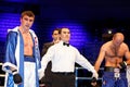 Danil Shved and Ioannis Militopulos stand on boxing ring