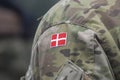 Danish army uniform with the Danish flag on the shoulder. Danish military, selective focus Royalty Free Stock Photo
