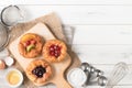 Danish bread with fruits, blueberry and cherry sauce Royalty Free Stock Photo