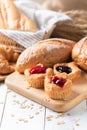 Danish bread with fruits, blueberry and cherry sauce Royalty Free Stock Photo