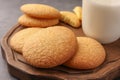 Delicious Danish butter cookies and milk on wooden board, closeup Royalty Free Stock Photo