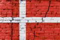 Danish flag painted on an old brick wall
