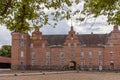 The danish Holsteinborg Castle and courtyard under green beech branches Royalty Free Stock Photo