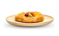 Danish pastry with fruits in wooden dish isolated on white background ,include clipping path Royalty Free Stock Photo