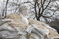 Dante Alighieri monument on the hills of Kyiv covered with sand bags