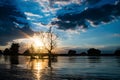 Danube Delta sunset with sun reflecting in the water