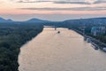 Danube river and Bratislava cityscape at sunset, Slovakia.