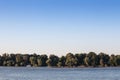 Cargo ship, a barge, cruising on the Danube river in Serbia, in belgrade, carrying construction material, coal, sand and gravel. Royalty Free Stock Photo