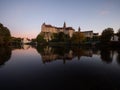 Danube river sunset mirror reflection of medieval fortress castle Schloss Sigmaringen in Baden-Wuerttemberg Germany Royalty Free Stock Photo