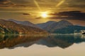 The Danube river at sunset and a spectacular sky with the reflection of the hills in the water wallpaper Royalty Free Stock Photo