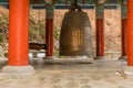 Giant brass bell in colorful pavilion