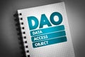 DAO - Data Access Object acronym on notepad, technology concept background Royalty Free Stock Photo