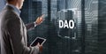 DAO. Decentralized Autonomous Organization. Businessman clicking on virtual screen