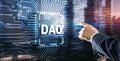 DAO. Decentralized Autonomous Organization. Businessman clicking on virtual screen