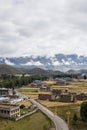 Traditional Tibetan countryside with fields and mountains around Daocheng Royalty Free Stock Photo