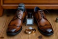 Dapper details grooms brown shoes, belt, perfume, and golden rings