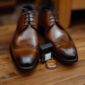 Dapper details grooms brown shoes, belt, perfume, and golden rings