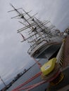 Dar Pomorza famous polish sailing ship docked in port of Gdynia, Poland in gray boring day Royalty Free Stock Photo