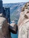 Norway - Kjerag hanging above the fjord Royalty Free Stock Photo