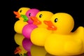 Dare to be different - rubber ducks on black Royalty Free Stock Photo