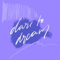 Dare to dream. Inspirational quote for posters and cards. White text on abstract violet background. Handwritten