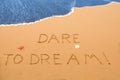 Dare to dream written in the sand Royalty Free Stock Photo