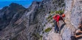 A daring European tourist rock climbing in Cape Town South Afric