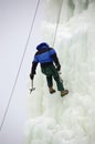 Daring Ice Climber on a Rope Royalty Free Stock Photo