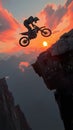 Daring mountain feat motorbike rider performs sunset stunt on rocky slope Royalty Free Stock Photo