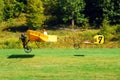 A daring pilot takes off in the open cockpit of a Bleroit XI airplane Royalty Free Stock Photo