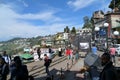 Visitors taking in the sights of Darjeeling at the railway station and the towering snow-clad Kanchenjunga Himalayan ranges