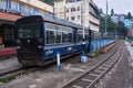 DARJEELING, INDIAN -June 22, The toy train of Darjeeling Himalayan Railway runs on the track in Darjeeling, India. Darjeeling Royalty Free Stock Photo