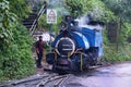 DARJEELING, INDIAN -June 22, The toy train of Darjeeling Himalayan Railway runs on the track in Darjeeling, India. Darjeeling Royalty Free Stock Photo