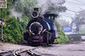 DARJEELING, INDIAN -June 22, The toy train of Darjeeling Himalayan Railway runs on the track in Darjeeling, India. Darjeeling Royalty Free Stock Photo