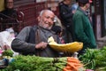 Darjeeling, West Bengal, India. June 22, 2022. A village man sitting on the road side of a busy area in Bagdogra for sell his