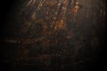 Dark abstract background with scuffs and scratches. Metal texture with rust