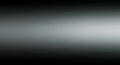 Abstract grayscale gradient background with subtle light streaks and pixelated texture Royalty Free Stock Photo