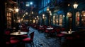 a dark alley at night with tables and chairs