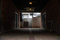 Dark alley tunnel in  St. Charles, Missouri, Main Stre with a staircase in the background Royalty Free Stock Photo
