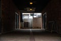 Dark alley tunnel in St. Charles, Missouri, Main Stre with a staircase in the background