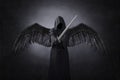 Dark angel with medieval sword Royalty Free Stock Photo