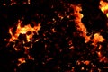 The dark background consists of flaming coal anthracite. Royalty Free Stock Photo