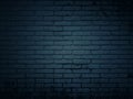 Dark background with dark patterned walls made of rectangular brick