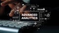 Dark Background Displaying Advanced Analytics Concept with Hands on Keyboard and Graphical Elements Representing Data Royalty Free Stock Photo
