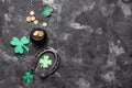 Leprechaun pot with golden coins and horseshoe on dark background. St. Patrick\'s Day celebration Royalty Free Stock Photo