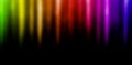 Dark background in rainbow colors. Bright green yellow orange red pink blue purple blurred grainy background for website banner Royalty Free Stock Photo